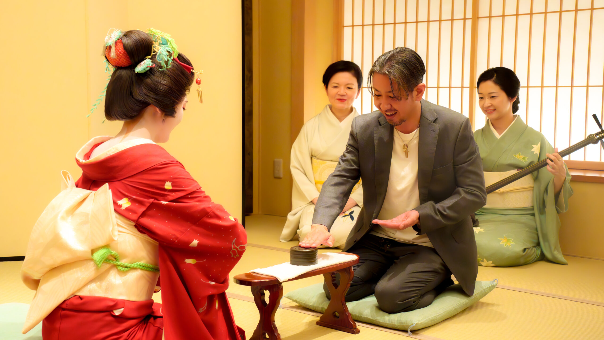 Guests and geisha playing konpira-fune-fune game with sake cups, laughing together